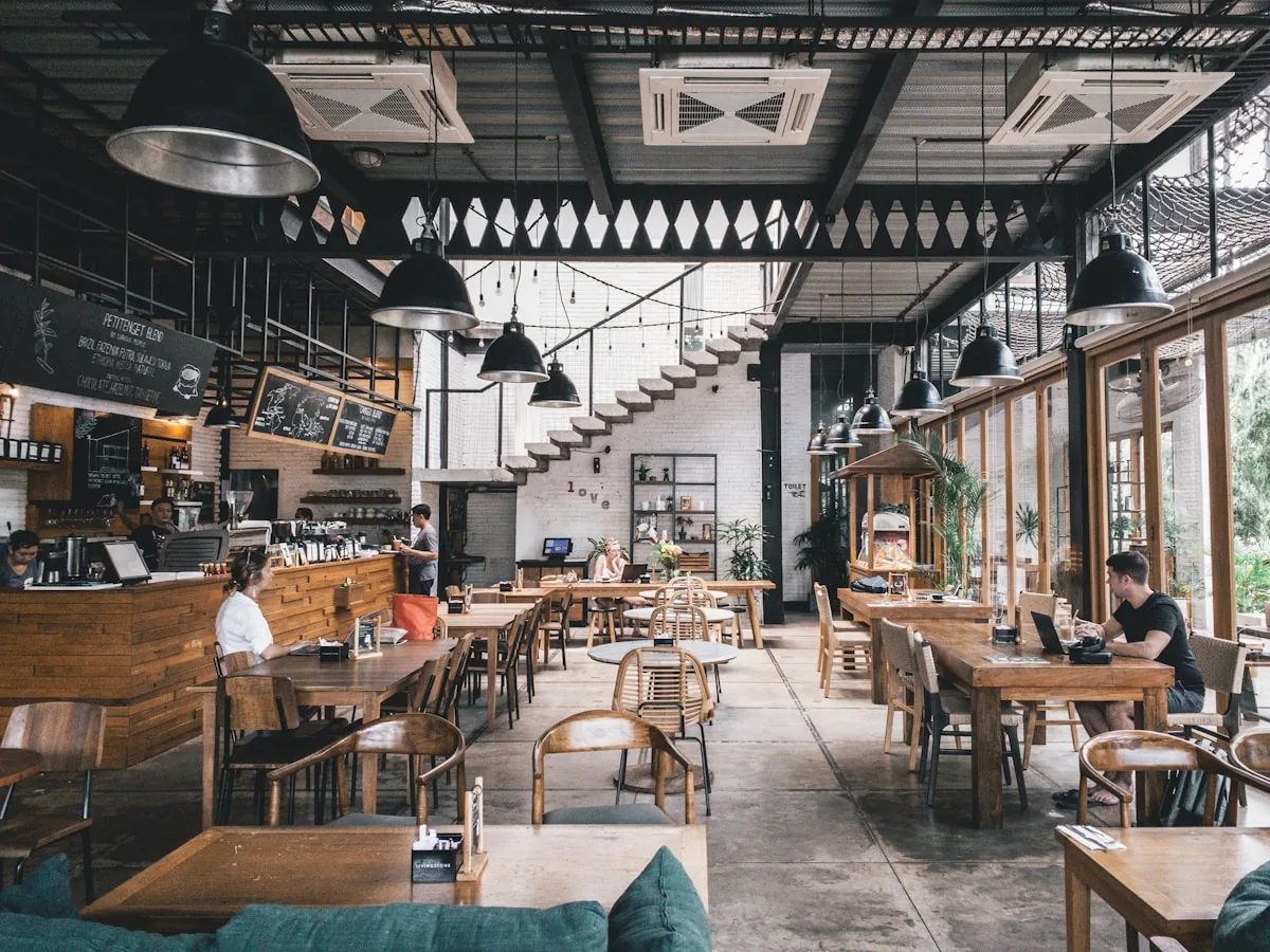 Warm interior of Panino's Pizza dining room